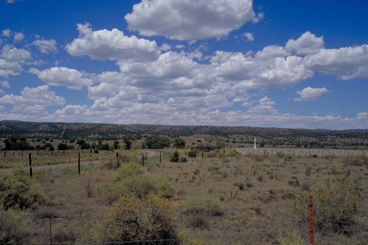 This distant view is of Fort Stanton Military Cemetery as seen from the Billy the Kid Scenic Byway.