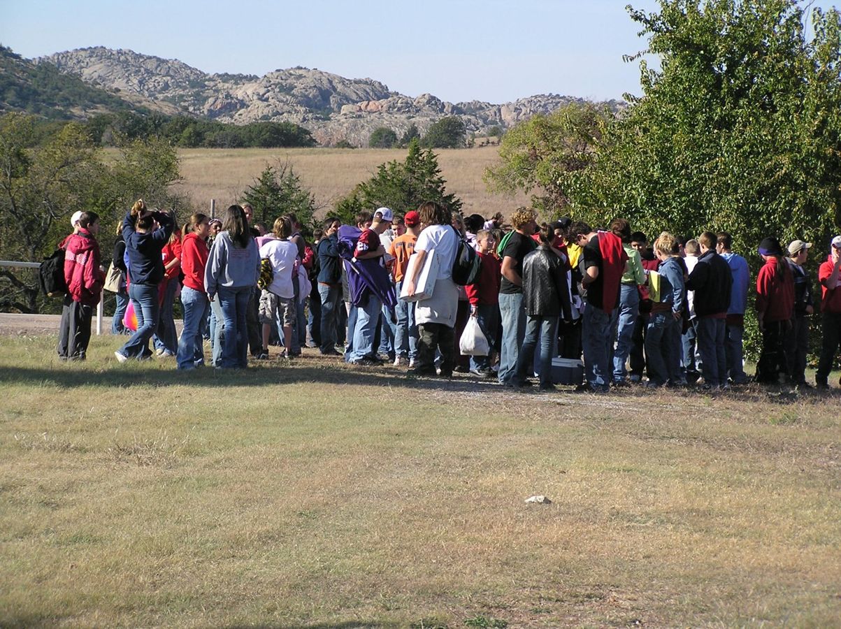 School children gather to learn more about the importance of the mix-grass prairie along the Wichita Mountains Byway.